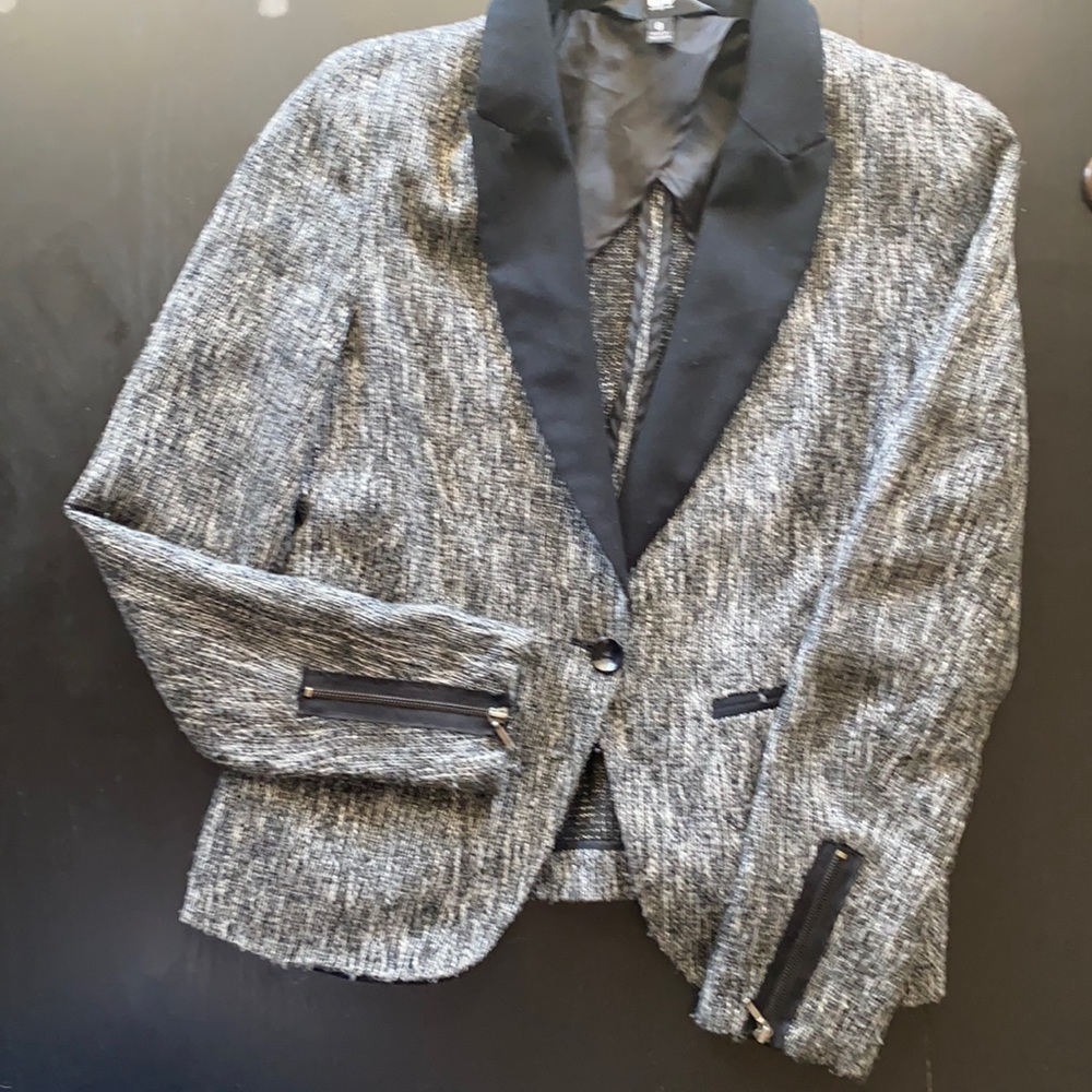 Mossimo jacket black and silver. Zippers at wrists size 8